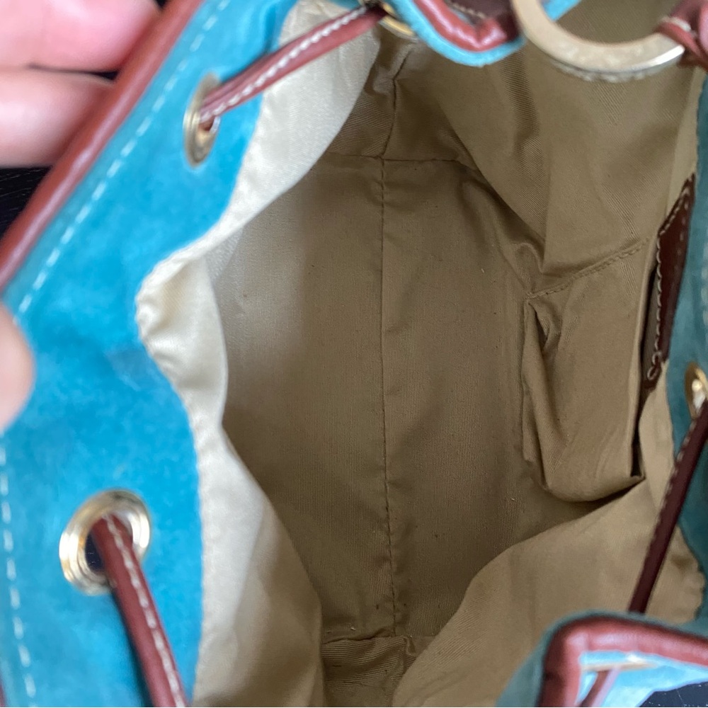 Claudia Firenze Quilted Drawstring
Nubuck Leather Handbag Studded
Bucket Bag - Picture 9 of 16